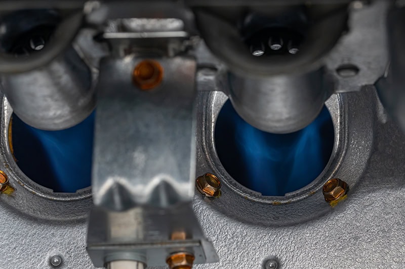 close-up of a gas furnace burner.